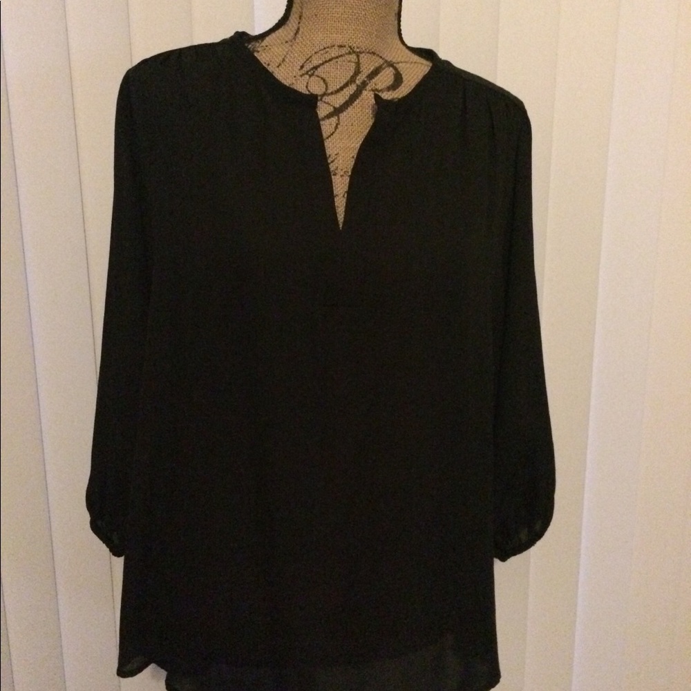 Blouse is great with jeans and or for the office!